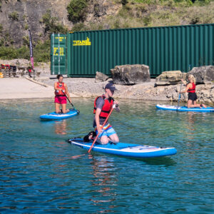 A 1.5-hour coached stand-up paddleboarding session.
